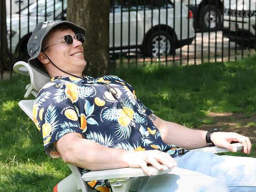 Ergonomic chair with auto-follow lumbar function